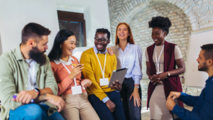 Diverse team of professionals having an animated discussion in an office setting.